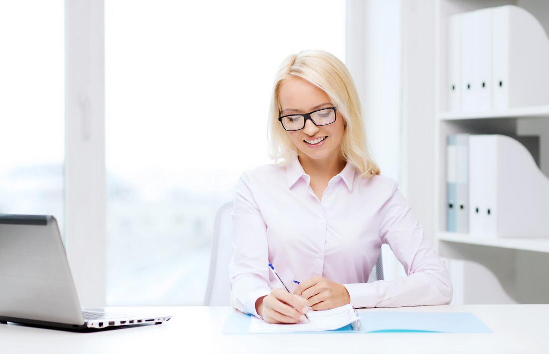 blonde woman working office