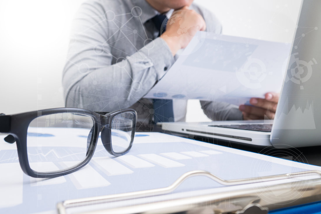 glasses working desk laptop